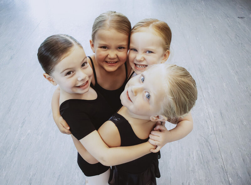 Young dancers participating in Snowflake Spectacular movement games at Miller Street Dance Academy